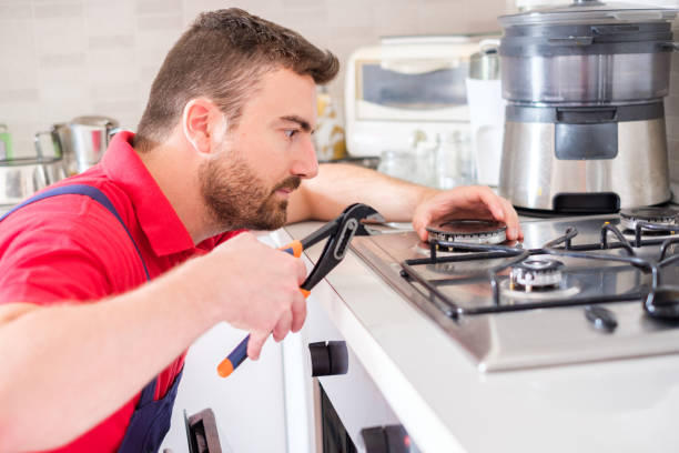 Installing a new hob in modern kitchen